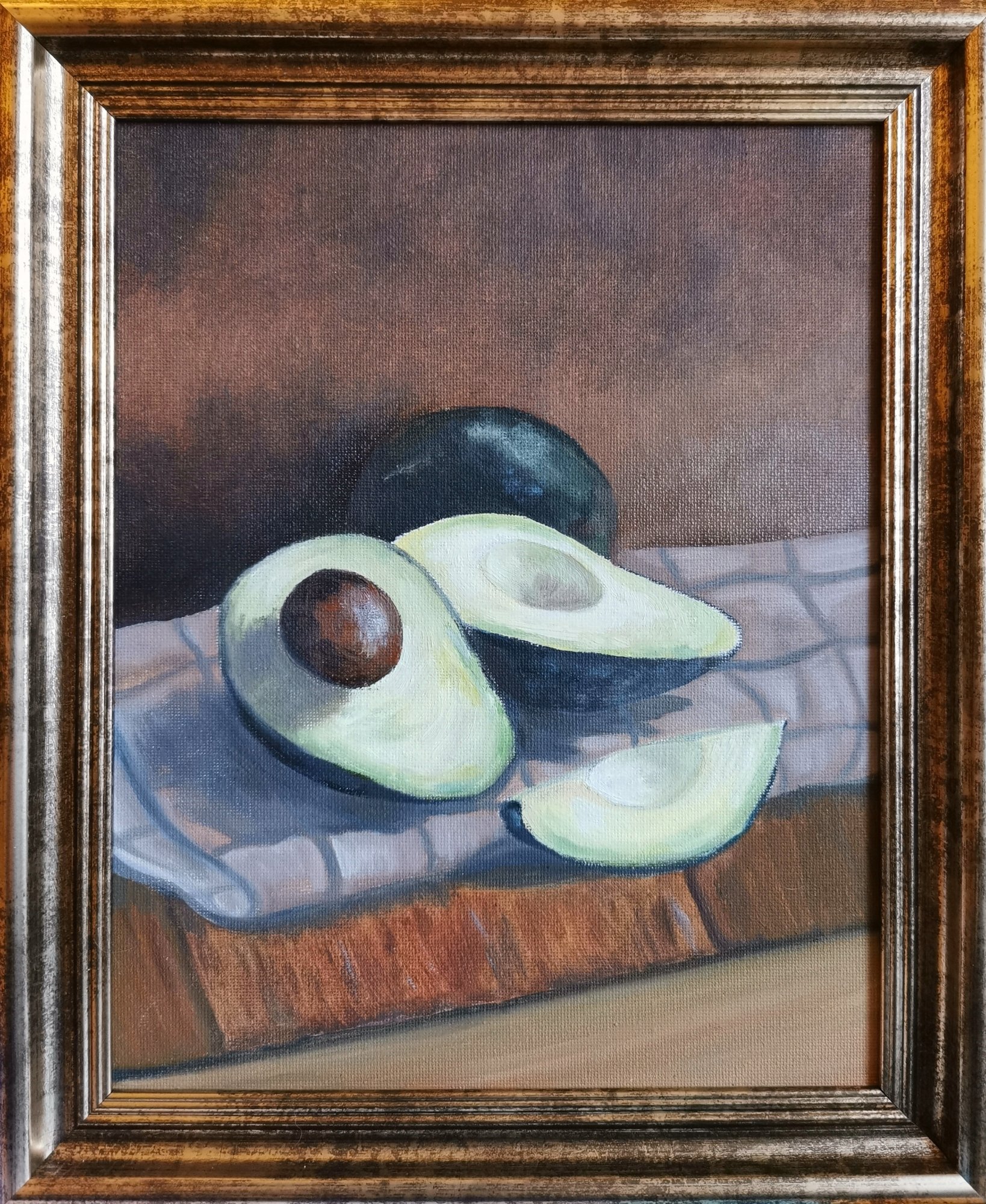Avocados painted in oils with a gold frame